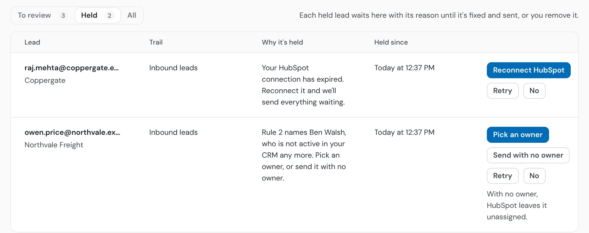 The Held view of the Leads tab: one lead held because the HubSpot connection expired, with Reconnect HubSpot, and one because its rule names a rep who has left, with Pick an owner